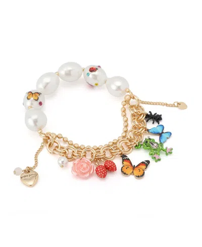 Betsey Johnson Faux Stone Backyard Butterfly Mixed Charm Pearl Stretch Bracelet In Gold