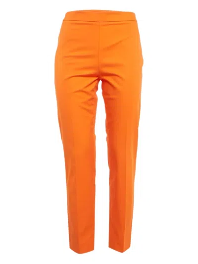 Pre-owned Moschino Tailored Trousers In Orange