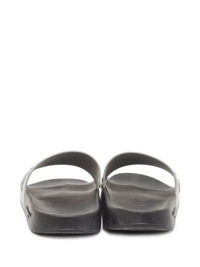Pre-owned Givenchy Logo-embossed Slides