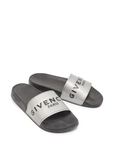 Pre-owned Givenchy Logo-embossed Slides