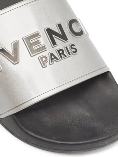 Pre-owned Givenchy Logo-embossed Slides