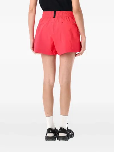 The North Face Fuchsia Logo Shorts In Pink