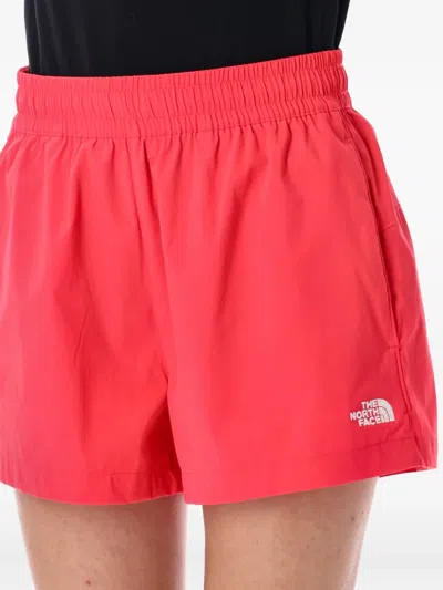 The North Face Fuchsia Logo Shorts In Pink