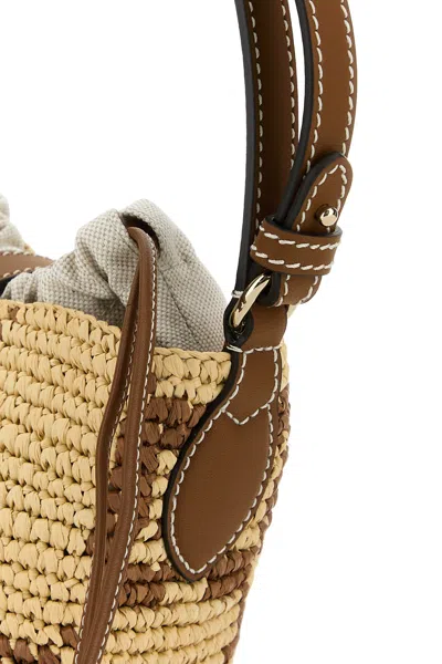 Gucci Borsa A Secchiello Gg Mini In Rafia Ricamata Donna