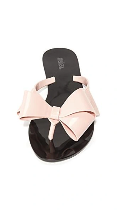 Shop Melissa Harmonic Bow Iii Thong Sandals In Black/pink