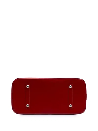 Pre-owned Louis Vuitton 2011 Epi Alma Gm Handbag In Red