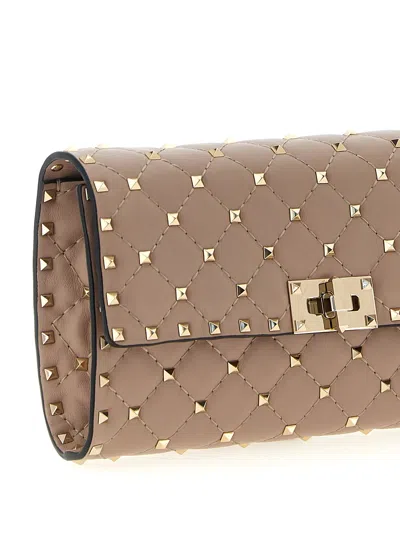 Valentino Garavani Rockstud Spike Nappa Leather Crossbody Clutch Bag Woman Poudre Uni In Pink