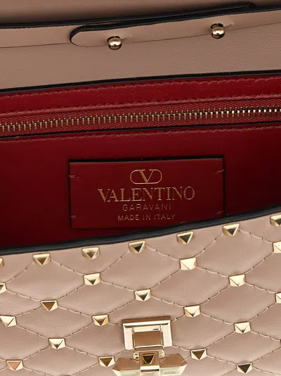 Valentino Garavani Rockstud Spike Nappa Leather Crossbody Clutch Bag Woman Poudre Uni In Pink