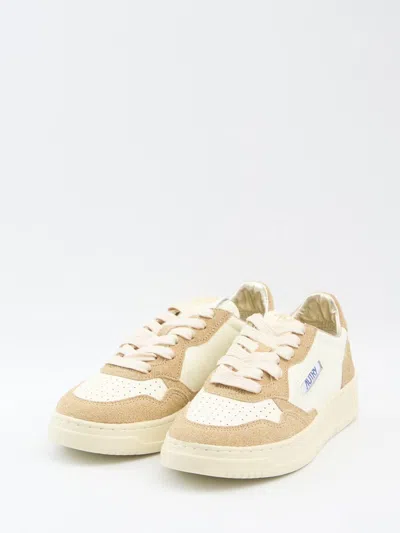 Autry Panelled Low Top Sneakers With Perforated Toe In Brown