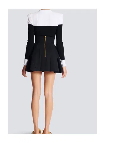 Balmain Button-embellished Pleated Grain De Poudre Wool Mini Skirt In Black