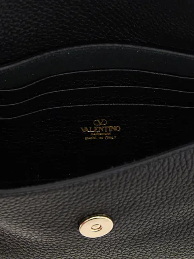 Valentino Garavani Rockstud Logo-embossed Leather Cross-body Bag In Black