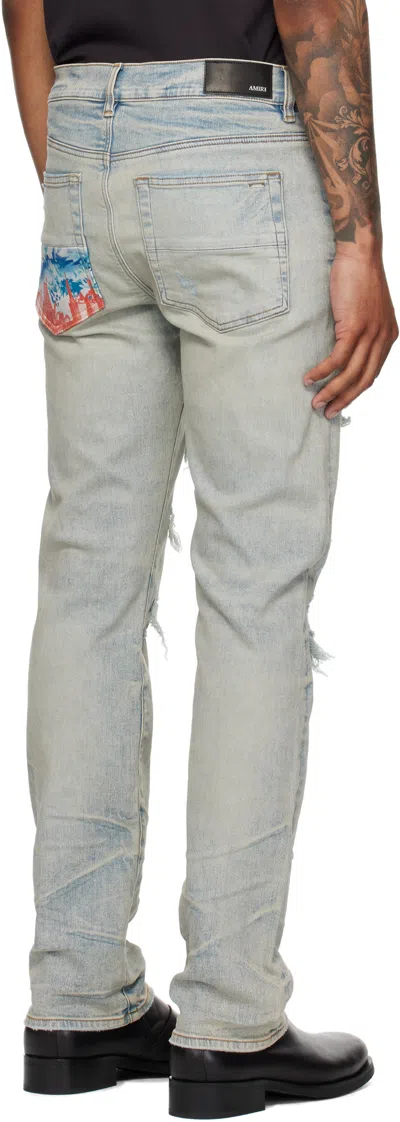 Amiri Clay Indigo Thrasher Lunar New Year Jeans In Gray