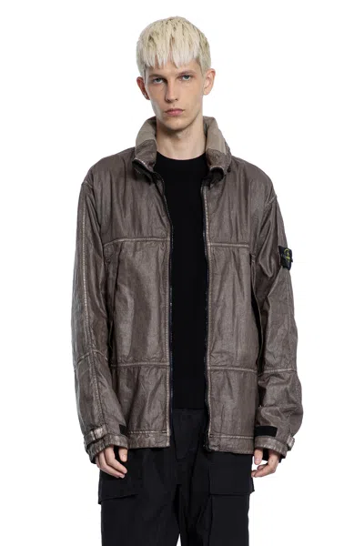 Stone Island Jacket With Transparent Resins And Foldable Co11ar In Blue