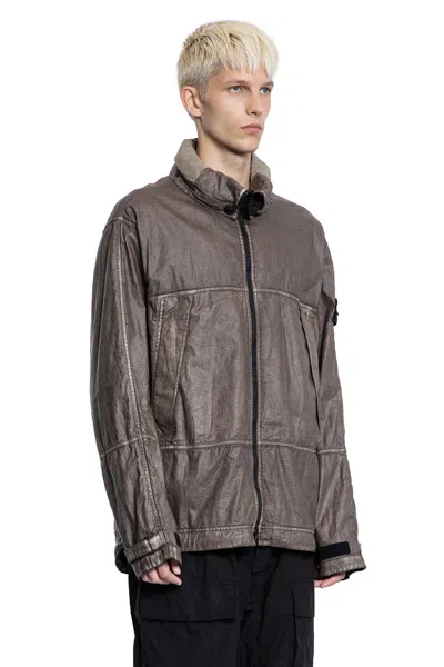 Stone Island Jacket With Transparent Resins And Foldable Co11ar In Blue