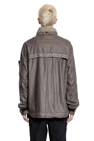 Stone Island Jacket With Transparent Resins And Foldable Co11ar In Blue