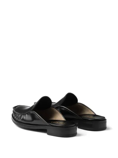 Prada Brushed Leather Mules In Black