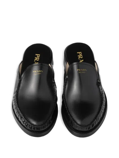 Prada Brushed Leather Mules In Black