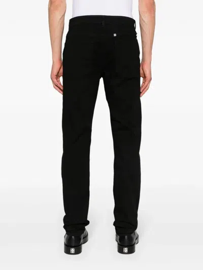 Givenchy Logo-plaque Slim-cut Jeans In Black
