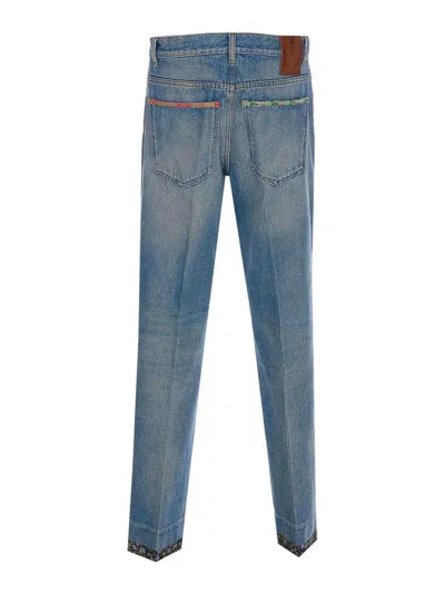 Valentino Garavani Medium Blue Floral Piped Jeans In Blue