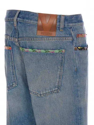 Valentino Garavani Medium Blue Floral Piped Jeans In Blue