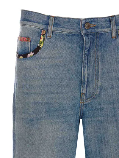 Valentino Garavani Medium Blue Floral Piped Jeans In Blue