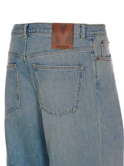 Valentino Rolled Cuffs Denim Trousers In Blue