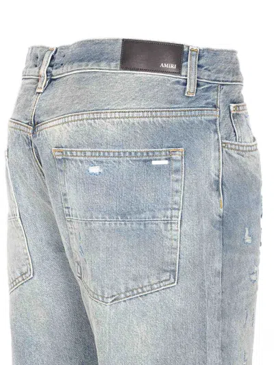 Amiri Straight Leg Mid-rise Distressed Trousers In Blue