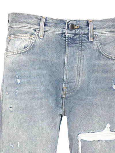 Amiri Straight Leg Mid-rise Distressed Trousers In Blue