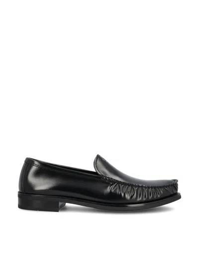 Prada Polished Leather Flat Shoes In Black