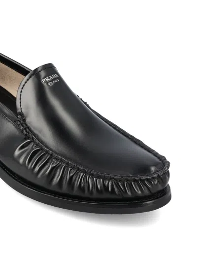 Prada Polished Leather Flat Shoes In Black