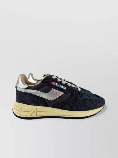 Autry Low Top Sneakers Featuring Silver Accents In Blue