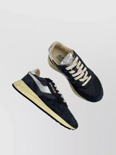 Autry Low Top Sneakers Featuring Silver Accents In Blue