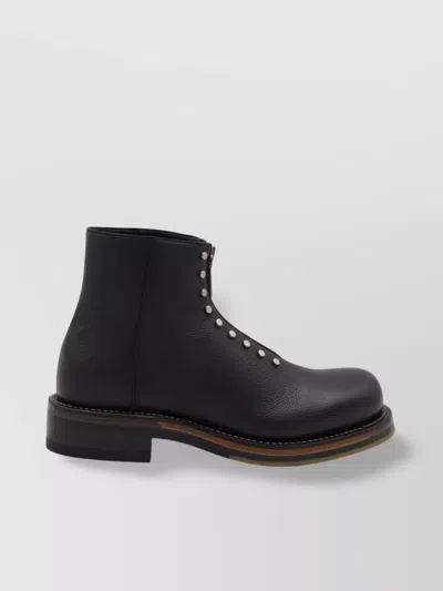 Alexander Mcqueen Chunky Sole Round Toe Studded Ankle Boots In Black