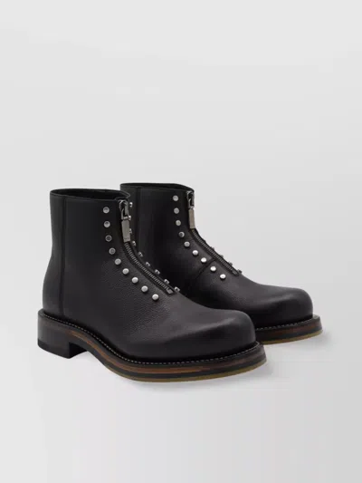 Alexander Mcqueen Chunky Sole Round Toe Studded Ankle Boots In Black