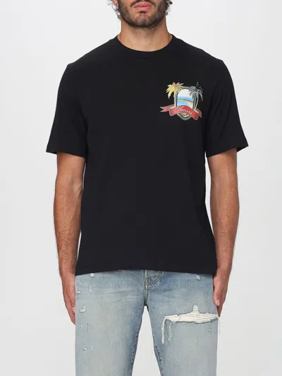 Amiri Black T-shirt With Logo Print And Graphic Design In Black