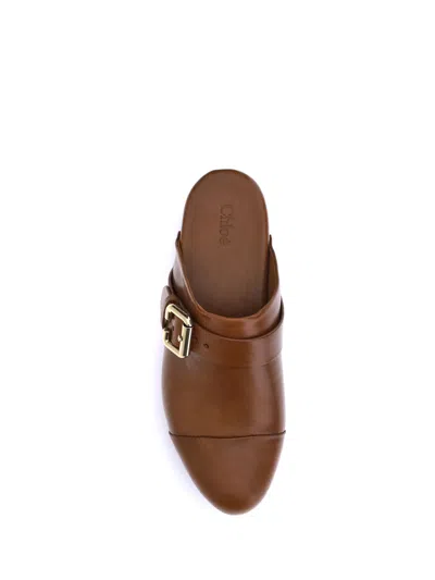 Chloé Jeannette Embellished Leather Platform Clogs In Brown