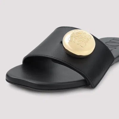 Loewe Elegant Black Calf Leather Sandals With Gold Embellishment In Black