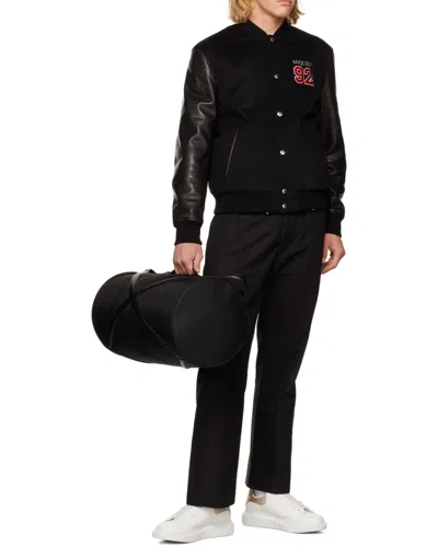 Alexander Mcqueen Logo Printed Zipped Duffel Bag
