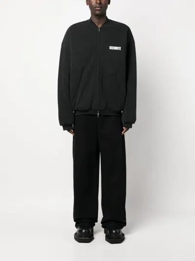 Vetements Slogan-print Cotton Bomber Jacket In Black