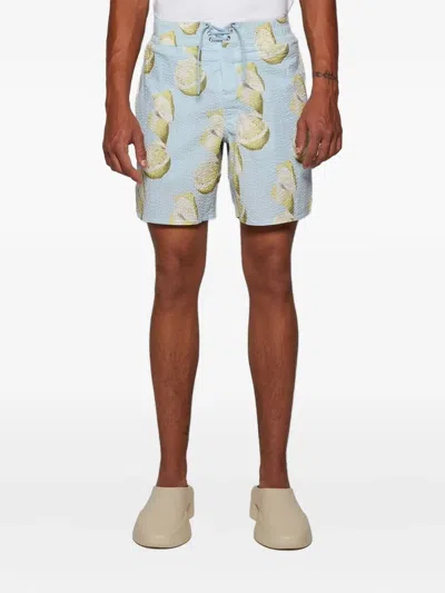 Givenchy Lemon-print Seersucker Swim Shorts In Blue