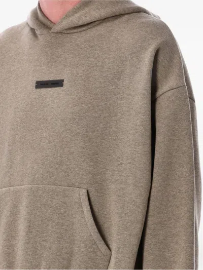 Essentials Logo-appliqué Fleece Hoodie In Brown
