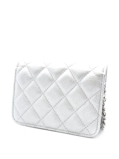 Pre-owned Chanel 2021-2025 Metallic Lambskin Crystal Star Chain Belt Bag In Silver