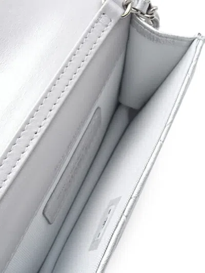 Pre-owned Chanel 2021-2025 Metallic Lambskin Crystal Star Chain Belt Bag In Silver