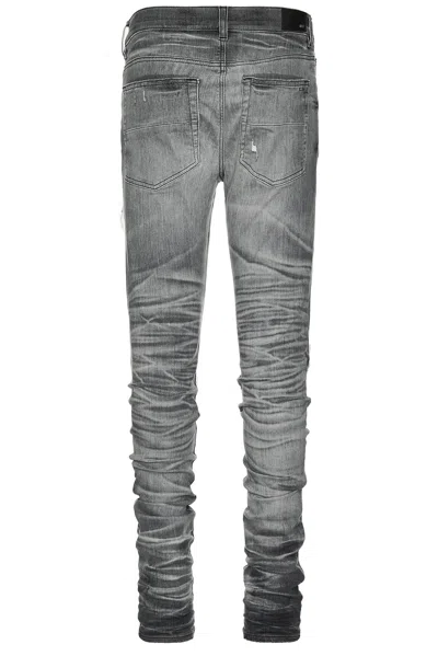 Amiri Stretch Denim Jeans Distressed Detailing In Black