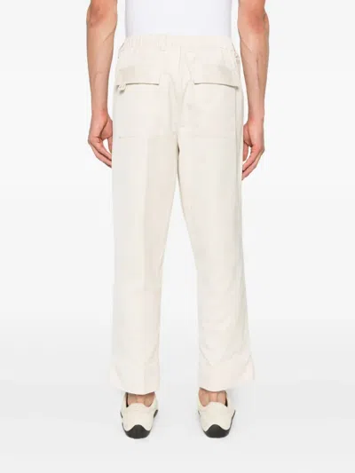 Rhun Pleated Turn-up Trousers In Neutral