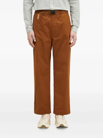 Human Made Slide-buckled Trousers In Brown