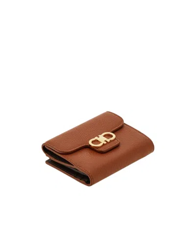 Ferragamo Gancini Compact Wallet In Brown