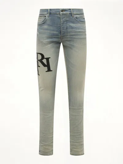 Amiri Men's Staggered Logo Skinny Jeans In Blue