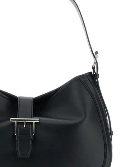 Alexander Mcqueen Black Shoulder Bag With Adjustable Shoulder Strap And T Buckle Closure On The Front In Leather Woman
