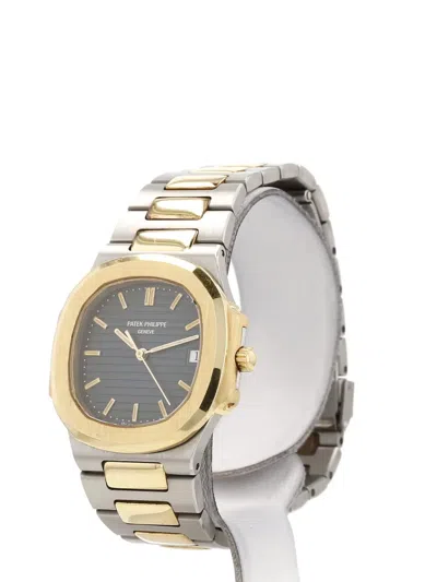 Pre-owned Patek Philippe 1990 Nautilus 32mm In Black